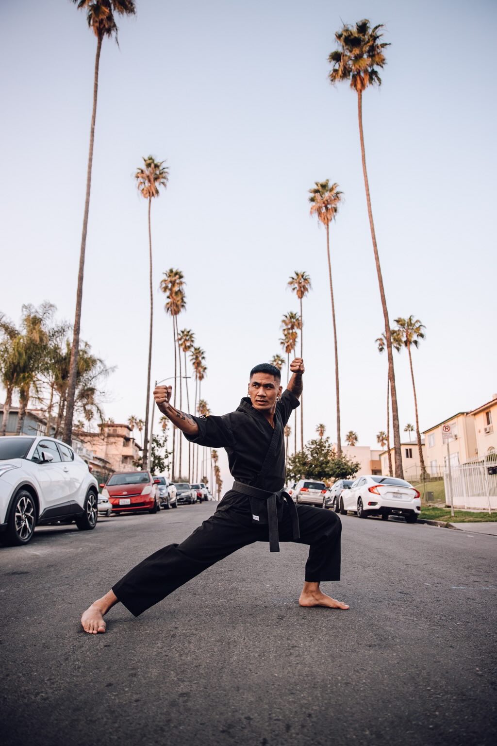 Rudy Reynon II in black gi martial arts stance — KAMASWITHRU