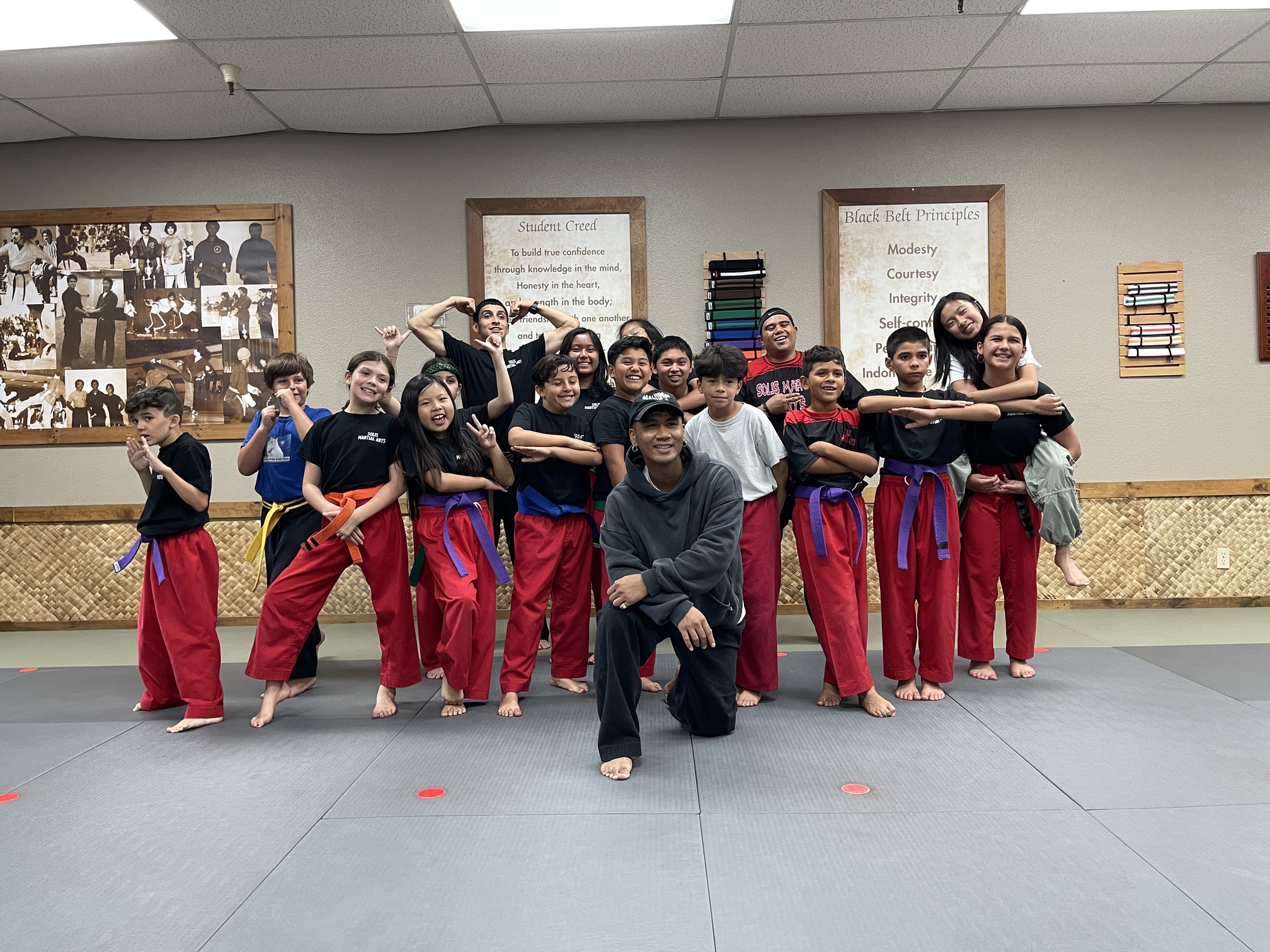 Rudy Reynon II with students at the dojo